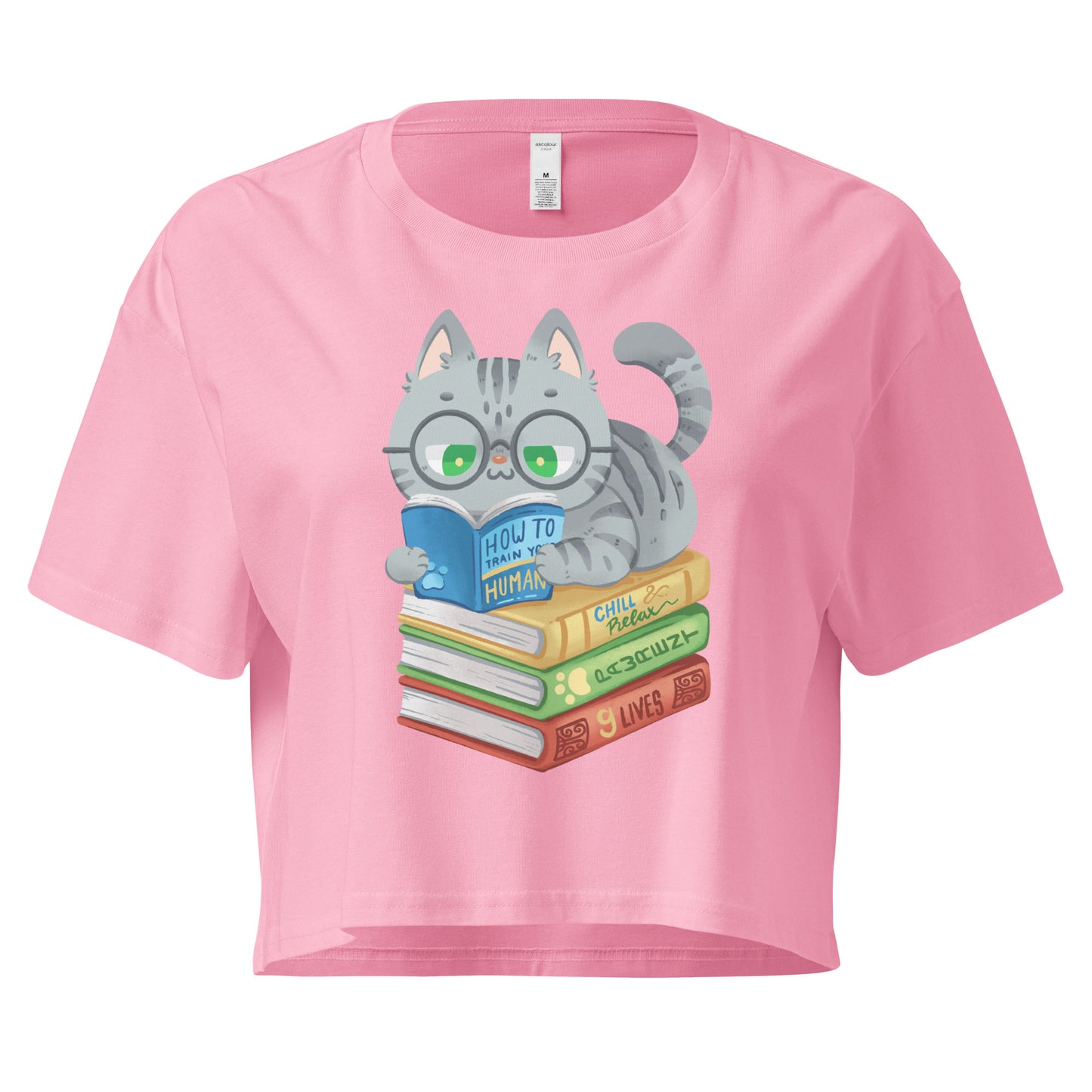 Pink crop top with cat in glasses reading on top of a pile of books design