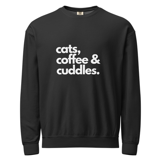 Black crewneck sweatshirt with 'cats, coffee & cuddles' text