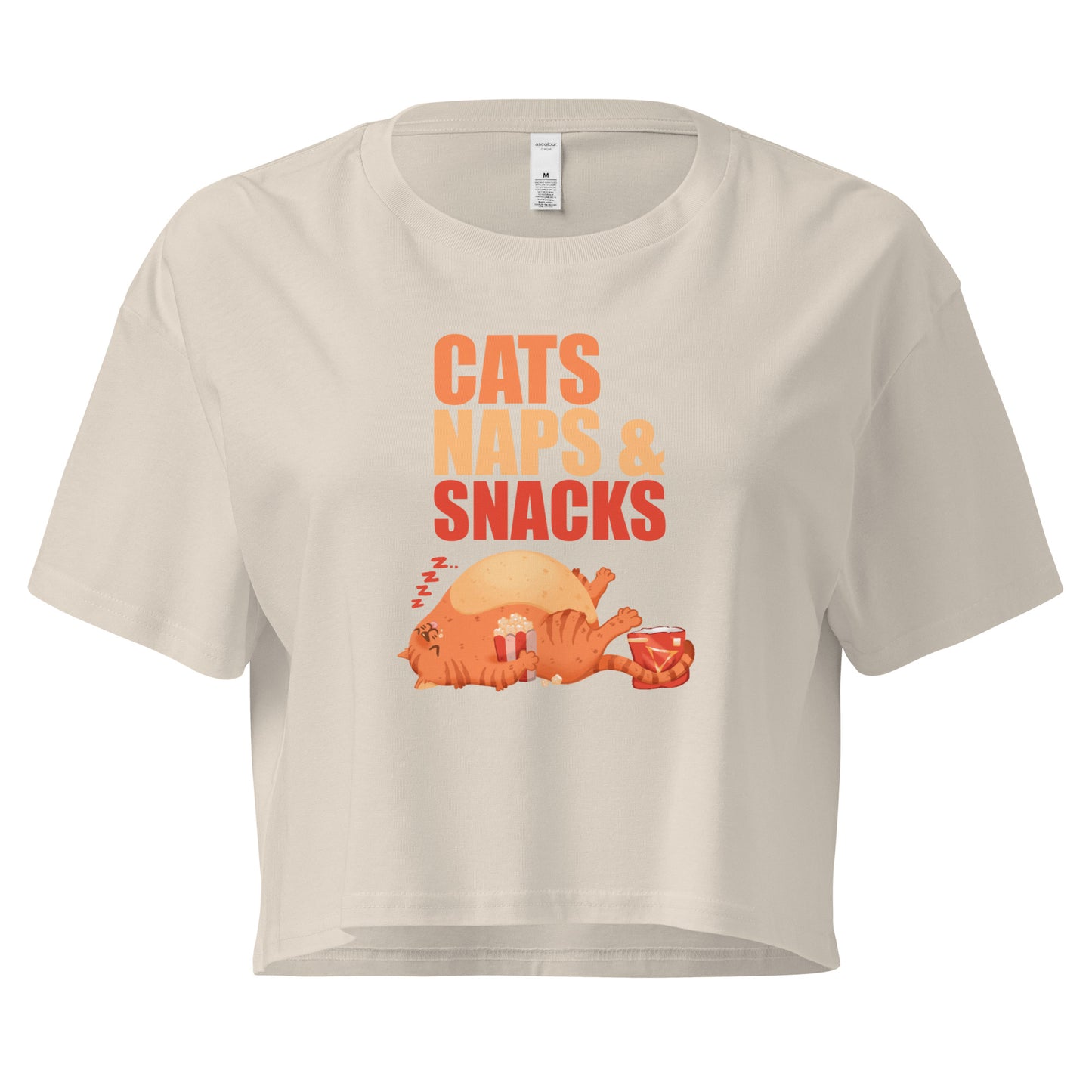 Beige crop top with a sleepy cat with snacks design with 'Cats Naps and Snacks' text 