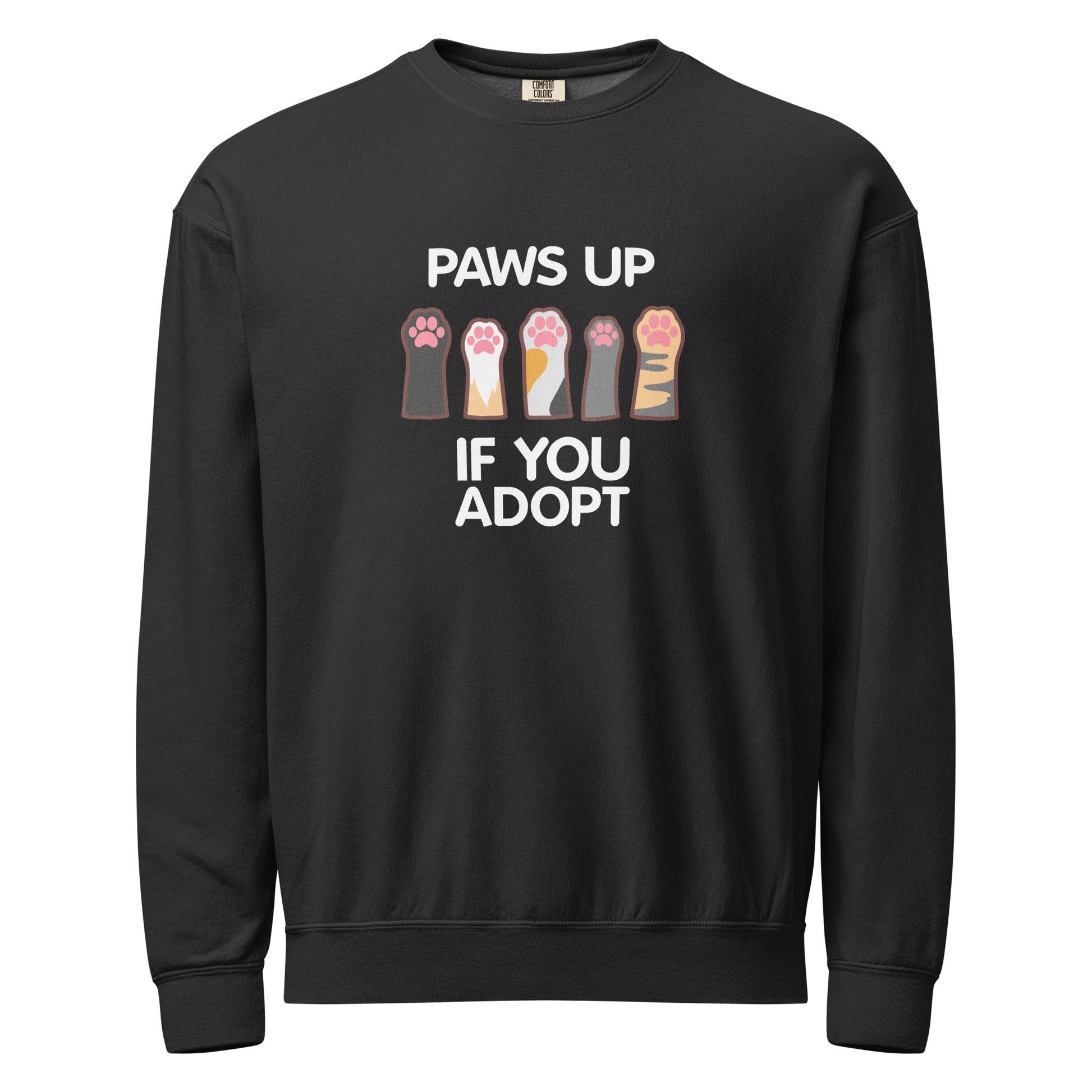 Black crewneck sweatshirt with paw prints design and text 'PAWS UP IF YOU ADOPT'